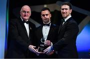 1 November 2019; Lancashire hurler Ronan Crowley is presented with his Champion 15 award by Uachtarán Cumann Lúthchleas Gael John Horan, left, and GPA Chairman Seamus Hickey during the PwC All-Stars 2019 at the Convention Centre in Dublin. Photo by Brendan Moran/Sportsfile