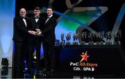 1 November 2019; Laois hurler Paddy Purcell is presented with his Joe McDonagh Cup Player of the Year award by Uachtarán Cumann Lúthchleas Gael John Horan and GPA Chairman Seamus Hickey during the PwC All-Stars 2019 at the Convention Centre in Dublin. Photo by Brendan Moran/Sportsfile