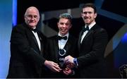 1 November 2019; Sligo hurler James Weir is presented with his Champion 15 award by Uachtarán Cumann Lúthchleas Gael John Horan, left, and GPA Chairman Seamus Hickey during the PwC All-Stars 2019 at the Convention Centre in Dublin. Photo by Brendan Moran/Sportsfile