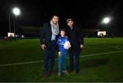 1 November 2019; Matchday mascot Ollie Barrett, from Donnybrook, Dublin, with Adam Byrne and Fergus McFadden ahead of the Guinness PRO14 Round 5 match between Leinster and Dragons at the RDS Arena in Dublin. Photo by Ramsey Cardy/Sportsfile