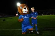 1 November 2019; Matchday mascot Dara Molloy, from Ballinteer, Dublin, with Leo The Lion ahead of the Guinness PRO14 Round 5 match between Leinster and Dragons at the RDS Arena in Dublin. Photo by Ramsey Cardy/Sportsfile