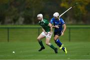 2 November 2019; Brian Ryan of Ireland in action against Iain Richardson of Scotland during the U21 Hurling Shinty International 2019 match between Ireland and Scotland at the GAA National Games Development Centre in Abbotstown, Dublin. Photo by Piaras Ó Mídheach/Sportsfile
