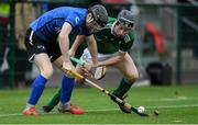 2 November 2019; Daniel Sloss of Scotland in action against Shane Conway of Ireland during the U21 Hurling Shinty International 2019 match between Ireland and Scotland at the GAA National Games Development Centre in Abbotstown, Dublin. Photo by Piaras Ó Mídheach/Sportsfile