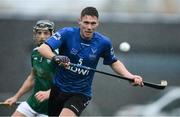 2 November 2019; Daniel Grieve of Scotland in action against Danny Cullen of Ireland during the Senior Hurling Shinty International 2019 match between Ireland and Scotland at the GAA National Games Development Centre in Abbotstown, Dublin. Photo by Piaras Ó Mídheach/Sportsfile