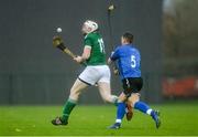 2 November 2019; Alan Grant of Ireland in action against Daniel Grieve of Scotland during the Senior Hurling Shinty International 2019 match between Ireland and Scotland at the GAA National Games Development Centre in Abbotstown, Dublin. Photo by Piaras Ó Mídheach/Sportsfile