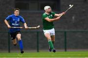 2 November 2019; Chris Nolan of Ireland in action against Findlay MacDonald of Scotland during the U21 Hurling Shinty International 2019 match between Ireland and Scotland at the GAA National Games Development Centre in Abbotstown, Dublin. Photo by Piaras Ó Mídheach/Sportsfile