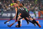 2 November 2019; Gillian Pinder of Ireland in action against Hannah Haughn, 13, and Elise Wong of Canada during the FIH Women's Olympic Qualifier match between Ireland and Canada at Energia Park in Dublin. Photo by Brendan Moran/Sportsfile
