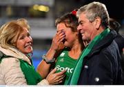 3 November 2019; Deirdre Duke of Ireland celebrates with her parents Greta and Brendan after qualifying for the Tokyo2020 Olympic Games after the FIH Women's Olympic Qualifier match between Ireland and Canada at Energia Park in Dublin. Photo by Brendan Moran/Sportsfile
