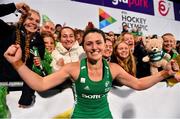 3 November 2019; Roisin Upton of Ireland celebrates with friends and family after qualifying for the Tokyo2020 Olympic Games after the FIH Women's Olympic Qualifier match between Ireland and Canada at Energia Park in Dublin. Photo by Brendan Moran/Sportsfile