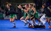 3 November 2019; Ireland players, from left, Nicola Daly, Roisin Upton, Bethany Barr, Chloe Watkins and Gillian Pinder celebrate winning the penalty strokes and qualifying for the Tokyo2020 Olympic Games during the FIH Women's Olympic Qualifier match between Ireland and Canada at Energia Park in Dublin. Photo by Brendan Moran/Sportsfile