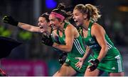 3 November 2019; Ireland players, from left, Roisin Upton, Bethany Barr and Chloe Watkins celebrate winning the penalty strokes and qualifying for the Tokyo2020 Olympic Games during the FIH Women's Olympic Qualifier match between Ireland and Canada at Energia Park in Dublin. Photo by Brendan Moran/Sportsfile