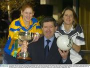 24 November 2003; The AIB Ladies Club Football Championship Senior and Junior Finals take place this Sunday, 30th November, in Nowlan Park, Kilkenny. Seneschalstown, Meath, will compete with Donaghmore, Cork, for the Senior Title while Fingallians, Dublin, will compete with Gabriel Rangers, Cork, for the Junior title. Pictured with the AIB Ladies Club Football Championship Senior Cup are Louise McKeever, Seneschalstown, left, Billy Finn, AIB, and Juliet Murphy, Donaghmore, right. Picture credit; David Maher / SPORTSFILE *EDI*