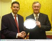 25 November 2003; The Minister for Arts, Sport and Tourism John O'Donoghue T.D. presents Peter Lawrie with a silver salver to commemorate him being the first Irishman to win the &quot; Rookie of the Year&quot;' award, Shelbourne Hotel, Dublin. Picture credit; Damien Eagers / SPORTSFILE *EDI*