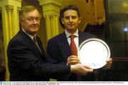25 November 2003; The Minister for Arts, Sport and Tourism John O'Donoghue T.D. presents Peter Lawrie with a silver salver to commemorate him being the first Irishman to win the &quot; Rookie of the Year&quot;' award, Shelbourne Hotel, Dublin. Picture credit; Damien Eagers / SPORTSFILE *EDI*
