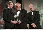 28 November 2003; J.J Delaney, Kilkenny, receives the Vodafone Hurler of the Year from An Taoiseach, Bertie Ahern T.D, in the presence of Paul Donovan, Chief Executive of Vodafone, at the VODAFONE GAA All-Star Awards in the Citywest Hotel, Dublin. Football. Hurling. Picture credit; Brendan Moran / SPORTSFILE *EDI*