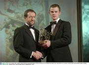 28 November 2003; Tommy Walsh, Kilkenny, is presented with his All-Star award by GAA President Sean Kelly at the VODAFONE GAA All-Star Awards in the Citywest Hotel, Dublin. Football. Hurling. Picture credit; Brendan Moran / SPORTSFILE *EDI*