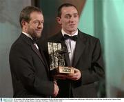 28 November 2003; Brian Dooher, Tyrone, is presented with his All-Star award by GAA President Sean Kelly at the VODAFONE GAA All-Star Awards in the Citywest Hotel, Dublin. Football. Hurling. Picture credit; Ray McManus / SPORTSFILE *EDI*