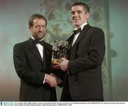 28 November 2003; Philip Jordan, Tyrone, is presented with his All-Star award by GAA President Sean Kelly at the VODAFONE GAA All-Star Awards in the Citywest Hotel, Dublin. Football. Hurling. Picture credit; Brendan Moran / SPORTSFILE *EDI*