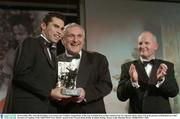 28 November 2003; Sean Og O'hAilpin, Cork receives the Vodafone Young Hurler of the Year on behalf of his brother Setanta, from An Taoiseach, Bertie Ahern T.D, in the presence of Paul Donovan, Chief Executive of Vodafone at the VODAFONE GAA All-Star Awards in the Citywest Hotel, Dublin. Football. Hurling. Picture credit; Brendan Moran / SPORTSFILE *EDI*
