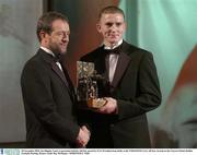 28 November 2003; Joe Higgins, Laois, is presented with his All-Star award by GAA President Sean Kelly at the VODAFONE GAA All-Star Awards in the Citywest Hotel, Dublin. Football. Hurling. Picture credit; Ray McManus / SPORTSFILE *EDI*
