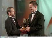 28 November 2003; Tom Kelly, Laois, is presented with his All-Star award by GAA President Sean Kelly at the VODAFONE GAA All-Star Awards in the Citywest Hotel, Dublin. Football. Hurling. Picture credit; Ray McManus / SPORTSFILE *EDI*