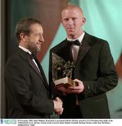 28 November 2003; John Mullane, Waterford, is presented with his All-Star award by GAA President Sean Kelly at the VODAFONE GAA All-Star Awards in the Citywest Hotel, Dublin. Football. Hurling. Picture credit; Ray McManus / SPORTSFILE *EDI*