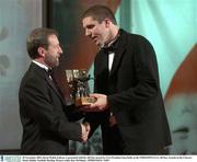 28 November 2003; Kevin Walsh, Galway, is presented with his All-Star award by GAA President Sean Kelly at the VODAFONE GAA All-Star Awards in the Citywest Hotel, Dublin. Football. Hurling. Picture credit; Ray McManus / SPORTSFILE *EDI*