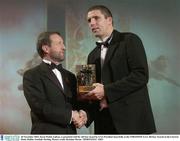 28 November 2003; Kevin Walsh, Galway, is presented with his All-Star award by GAA President Sean Kelly at the VODAFONE GAA All-Star Awards in the Citywest Hotel, Dublin. Football. Hurling. Picture credit; Brendan Moran / SPORTSFILE *EDI*