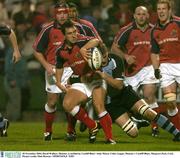 28 November 2003; David Wallace, Munster, is tackled by Cardiff Blues' Andy Moore. Celtic League, Munster v Cardiff Blues, Musgrave Park, Cork. Picture credit; Matt Browne / SPORTSFILE *EDI*