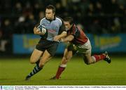 28 November 2003; Rhys Williams, Cardiff Blues, is tackled by Munster's David Wallace. Celtic League, Munster v Cardiff Blues, Musgrave Park, Cork. Picture credit; Matt Browne / SPORTSFILE *EDI*
