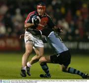 28 November 2003; Mike Mullins, Munster, is tackled by Cardiff Blues' Craig Morgan. Celtic League, Munster v Cardiff Blues, Musgrave Park, Cork. Picture credit; Matt Browne / SPORTSFILE *EDI*