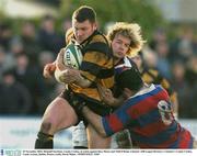 29 November 2003; Michaell Sweetman, County Carlow, in action against Dave Moore and Niall O'Brien, Clontarf. AIB League Division 1, Clontarf v County Carlow, Castle Avenue, Dublin. Picture credit; David Maher / SPORTSFILE *EDI*