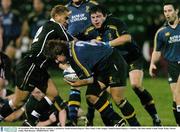 29 November 2003; Shane Byrne, Leinster, is tackled by Neath-Swansea Ospreys' Dave Tiueti. Celtic League, Neath-Swansea Ospreys v Leinster, The John Smith's Gnoll, Neath, Wales. Picture credit; Matt Browne / SPORTSFILE *EDI*