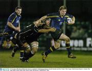 29 November 2003; Brian O'Driscoll, Leinster, is tackled by Neath-Swansea Ospreys' Gareth Llewellyn and Steve Tandy. Celtic League, Neath-Swansea Ospreys v Leinster, The John Smith's Gnoll, Neath, Wales. Picture credit; Matt Browne / SPORTSFILE *EDI*