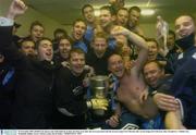29 November 2003; Dublin City players and staff celebrate in their dressing room after the were presented with the eircom League First Division title. eircom league First Division, Bray Wanderers v Dublin City, Whitehall, Dublin. Soccer. Picture credit; David Maher / SPORTSFILE *EDI*