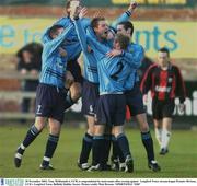 30 November 2003; Tony McDonnell, 6, UCD, is congratulated by team-mates after scoring against   Longford Town. eircom league Premier Division, UCD v Longford Town, Belfield, Dublin. Soccer. Picture credit; Matt Browne / SPORTSFILE *EDI*