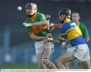 30 November 2003; Donal Mulcahy, Newtownshandrum, in action against Patrickswell's Paul O'Reilly. AIB Munster Senior Hurling Club Championship Final, Newtownshandrum v Patrickswell, Semple Stadium, Thurles, Co. Tipperary. Picture credit; Pat Murphy / SPORTSFILE *EDI*