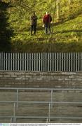 16 November 2003; Two spectators watch the match from a hill overlooking the pitch. M Donnelly Interprovincial Senior Football Final, Connacht v Ulster, Brewster Park, Enniskillen, Co. Fermanagh. Picture credit; Damien Eagers / SPORTSFILE *EDI*