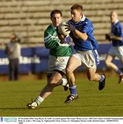 30 November 2003; Sean Burns, St. Gall's, in action against The Loup's Brian Lavery. AIB Ulster Senior Football Championship Final, St. Gall's v The Loup, St. Tighearnach's Park, Clones, Co. Monaghan. Picture credit; Damien Eagers / SPORTSFILE *EDI*