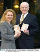 4 December 2003; T.V. commentator Jimmy Magee with former Olympic swimmer Michelle De Bruin at the launch of his new video Greatest Sporting Memories which contains his top 25 Greatest Sporting Memories, the proceeds of which go to the 3T's (Turning The Tide of Suicide) an organisation that creates awareness, research and education of suicide. The Holiday Inn Hotel, Pearse Street, Dublin. Picture credit; Ray McManus / SPORTSFILE *EDI*