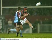 6 December 2003; Mike Mullins, Munster, in action against Bourgoin's Florian Fritz. Heineken Cup, Pool 5, Round 1, Bourgoin v Munster, Stade Pierre Rajon, Bourgoin, France. Picture credit; Matt Browne / SPORTSFILE *EDI*