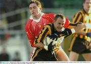 7 December 2003; Brian Lacey, Round Towers, is tackled by Declan Lally, St. Brigids. AIB Leinster Club Senior Football Championship Final, St. Brigids v Round Towers, Pairc Tailteann, Navan, Co. Meath. Picture credit; David Maher / SPORTSFILE *EDI*