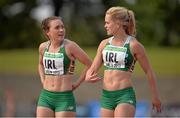 22 June 2013; Ireland's Niamh Whelan, left, and Ailis McSweeney, after their 4x100m relay during the European Athletics Team Championships 1st League. Morton Stadium, Santry, Co. Dublin. Picture credit: Brendan Moran / SPORTSFILE