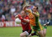 23 June 2013; Brendan Coulter, Down, in action against Neil McGee, Donegal. Ulster GAA Football Senior Championship Semi-Final, Donegal v Down, Kingspan Breffni Park, Cavan. Picture credit: Brian Lawless / SPORTSFILE