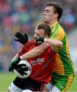 23 June 2013; Conor Laverty, Down, in action against Eamonn McGee, Donegal. Ulster GAA Football Senior Championship Semi-Final, Donegal v Down, Kingspan Breffni Park, Cavan. Picture credit: Brian Lawless / SPORTSFILE