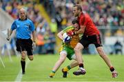 23 June 2013; Martin McElhinney, Donegal, in action against Ambrose Rogers, Down. Ulster GAA Football Senior Championship Semi-Final, Donegal v Down, Kingspan Breffni Park, Cavan. Picture credit: Brian Lawless / SPORTSFILE