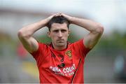 23 June 2013; Down's Keith Quinn shows his disappointment after the match. Ulster GAA Football Senior Championship Semi-Final, Donegal v Down, Kingspan Breffni Park, Cavan. Picture credit: Brian Lawless / SPORTSFILE