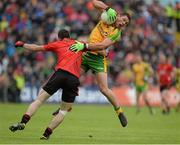 23 June 2013; Ryan Bradley, Donegal, in action against Keith Quinn, Down. Ulster GAA Football Senior Championship Semi-Final, Donegal v Down, Kingspan Breffni Park, Cavan. Picture credit: Oliver McVeigh / SPORTSFILE