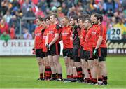 23 June 2013; The Down team stand for a minute silence. Ulster GAA Football Senior Championship Semi-Final, Donegal v Down, Kingspan Breffni Park, Cavan. Picture credit: Brian Lawless / SPORTSFILE