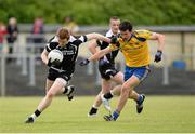 23 June 2013; Cathal Henry, Sligo, in action against Tadgh O'Rourke, Roscommon. Connacht GAA Football Minor Championship Semi-Final, Sligo v Roscommon, Sean McDermott Park, Carrick-on-Shannon, Co. Leitrim. Picture credit: Matt Browne / SPORTSFILE